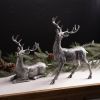 Deer (Set of 2) 9"L x 9.5"H, 9.25"L x 13.25"H Resin